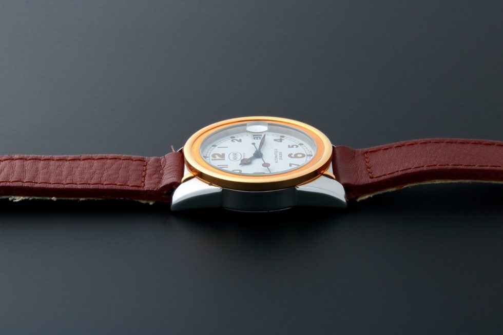 MHR Mahara Date Tutone White Dial Watch – Baer & Bosch Auctioneers