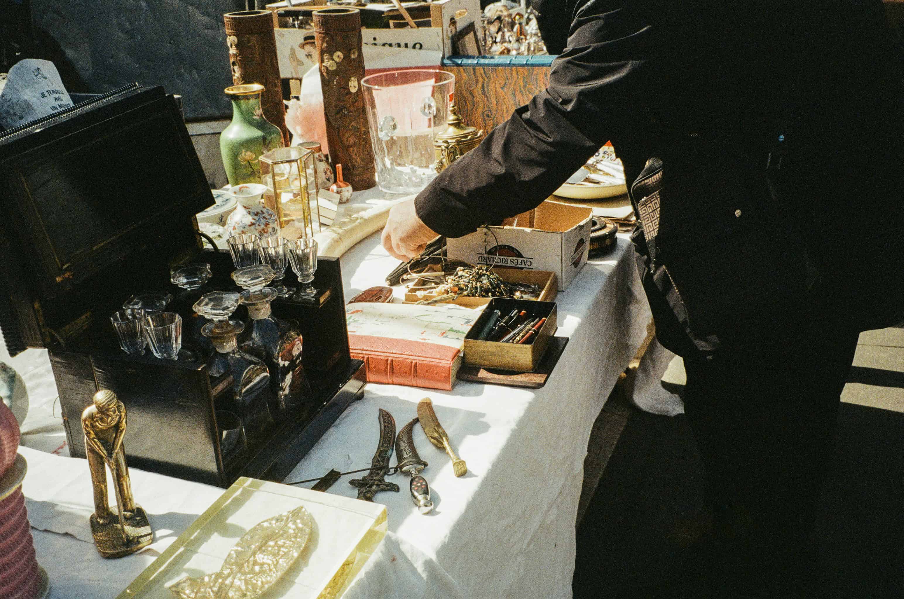 Collector examining an object to assess authenticity and provenance